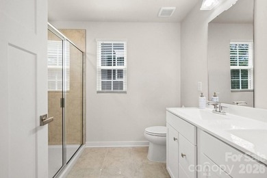 Welcome to this beautifully appointed corner unit townhome in - photo 13