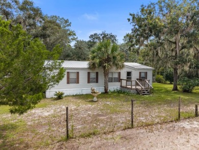 Lake Home For Sale in Old Town, Florida