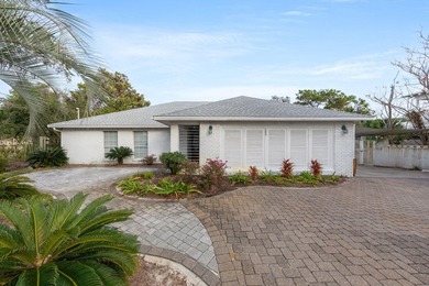 Discover a rare blend of coastal elegance and serene lakefront - photo 3