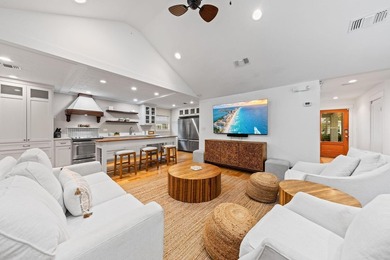 Discover a rare blend of coastal elegance and serene lakefront - photo 4