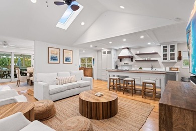 Discover a rare blend of coastal elegance and serene lakefront - photo 6