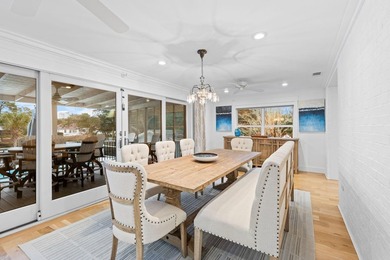 Discover a rare blend of coastal elegance and serene lakefront - photo 8