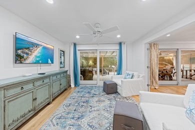 Discover a rare blend of coastal elegance and serene lakefront - photo 9