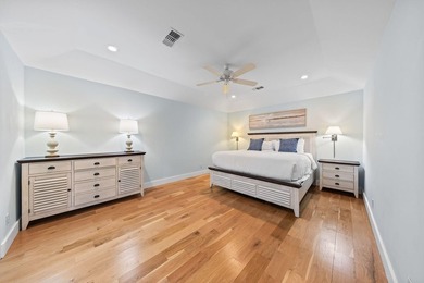 Discover a rare blend of coastal elegance and serene lakefront - photo 10
