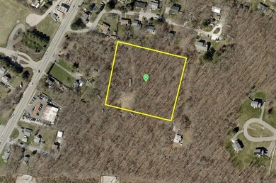 Serene 2.85-acre rear lot zoned R60, set back from Main Road in - photo 1
