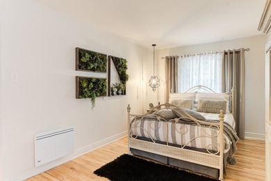 Ce triplex impeccable, entretenu avec le plus grand soin au fil - photo 12