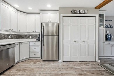 This beautifully updated 4-bedroom, 2-bath home on Barton Lake - photo 11