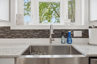 This beautifully updated 4-bedroom, 2-bath home on Barton Lake - photo 12