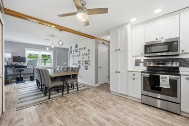 This beautifully updated 4-bedroom, 2-bath home on Barton Lake - photo 16