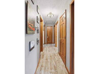 This beautifully updated 4-bedroom, 2-bath home on Barton Lake - photo 27