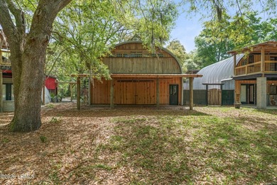 Tucked away down a quiet dirt road on 4.83 private acres on - photo 4