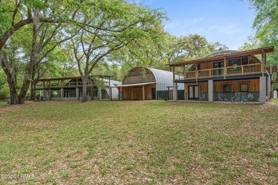 Tucked away down a quiet dirt road on 4.83 private acres on - photo 7