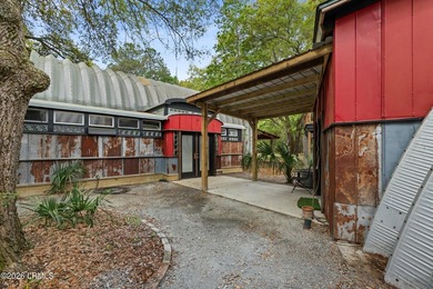 Tucked away down a quiet dirt road on 4.83 private acres on - photo 8