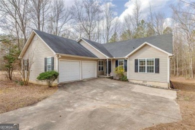 Lake Home For Sale in Powder Springs, Georgia
