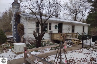 (private lake, pond, creek) Home Sale Pending in Frankfort Michigan
