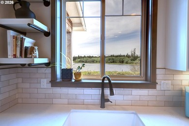 Enjoy peaceful lake and wildlife views from the covered front - photo 12