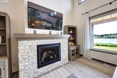 Enjoy peaceful lake and wildlife views from the covered front - photo 20