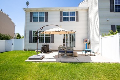 Price Improved! Welcome to this well-maintained 2-story end-unit - photo 3