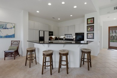 Now offered at a new price, this beautifully furnished golf - photo 35