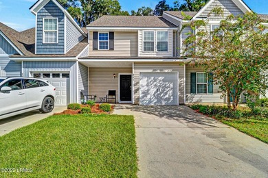 Upgraded 2 Bedroom Townhome with Attached Garage in Azalea - photo 1