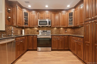 Welcome to resort-style living in the highly sought-after gated - photo 4