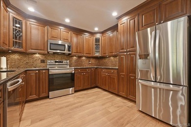 Welcome to resort-style living in the highly sought-after gated - photo 5