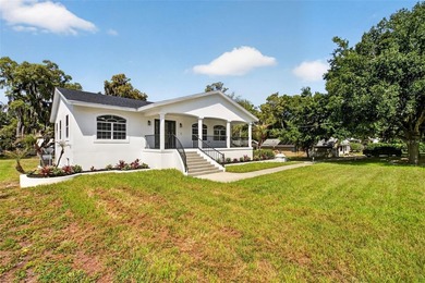 Set on a prominent corner lot in one of Windermere's most - photo 1