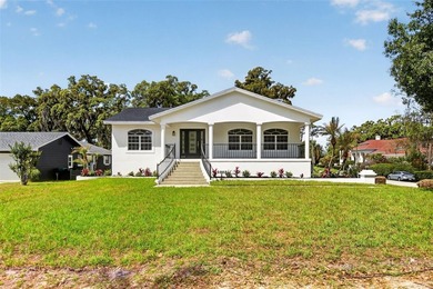 Set on a prominent corner lot in one of Windermere's most - photo 2