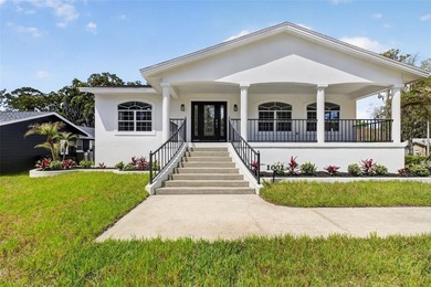 Set on a prominent corner lot in one of Windermere's most - photo 3