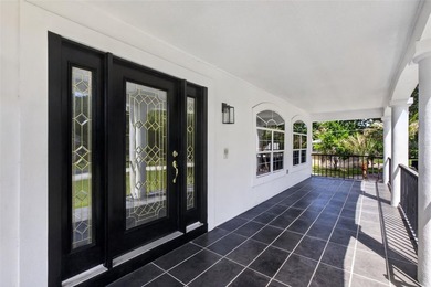 Set on a prominent corner lot in one of Windermere's most - photo 7
