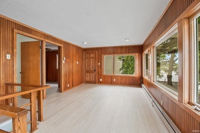 Lake season is finally here. Built in 1921, this cottage is full - photo 13