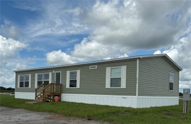 (private lake, pond, creek) Home For Sale in Okeechobee Florida