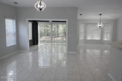 Light-filled one-level end unit in Sun City, tucked away on a - photo 3