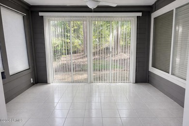 Light-filled one-level end unit in Sun City, tucked away on a - photo 9