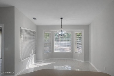 Light-filled one-level end unit in Sun City, tucked away on a - photo 10