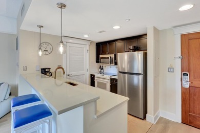 From this third floor covered balcony, enjoy beautiful views of - photo 4