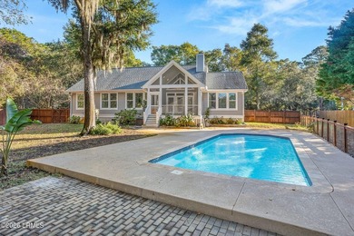 This beautifully designed home features a welcoming front porch - photo 1
