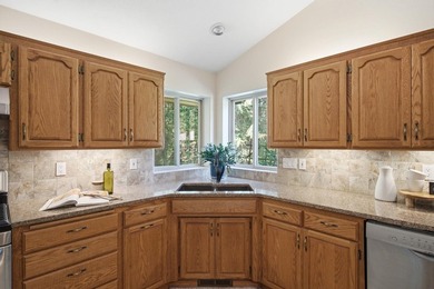Tucked on 2.6 private acres, this refined home blends comfort - photo 11