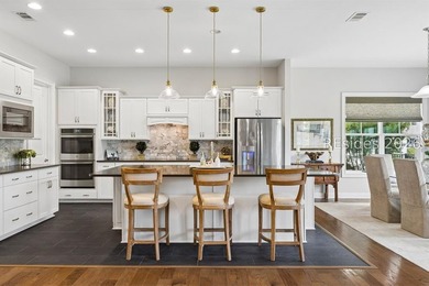 Welcome to 395 Castaway! Immaculate one-level living meets the - photo 12