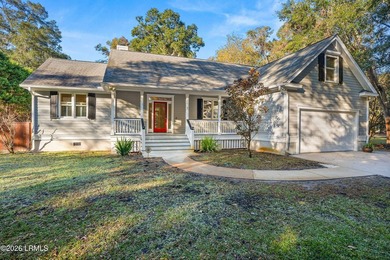 This beautifully designed home features a welcoming front porch - photo 3