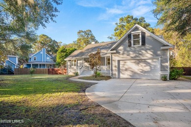 This beautifully designed home features a welcoming front porch - photo 4