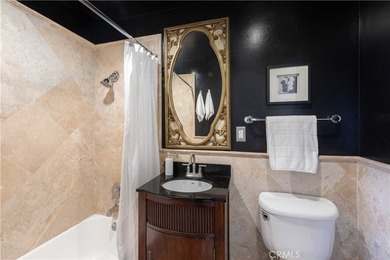 This stylish 1-bedroom, 1-bathroom condo in The Royal Palms is - photo 15