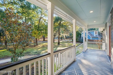 This beautifully designed home features a welcoming front porch - photo 6