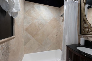This stylish 1-bedroom, 1-bathroom condo in The Royal Palms is - photo 16