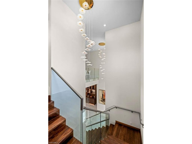 Discover an extraordinary new-construction estate, poised on - photo 29