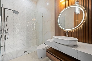 Discover an extraordinary new-construction estate, poised on - photo 49