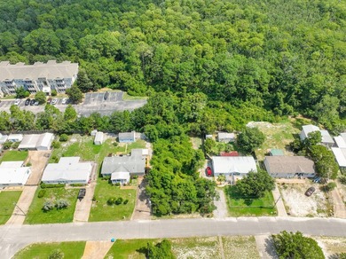 Step into coastal opportunity with this prime .22 of an acre lot - photo 3