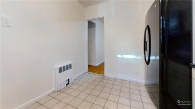 Located in the desirable Madison/Marine Park neighborhood, this