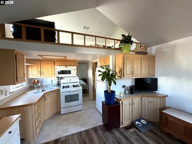 Updated 2004 park model located in the 55+ Chetco RV Park. This - photo 5