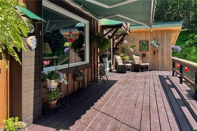 Escape to your own private woodland sanctuary set on 5 acres in - photo 6